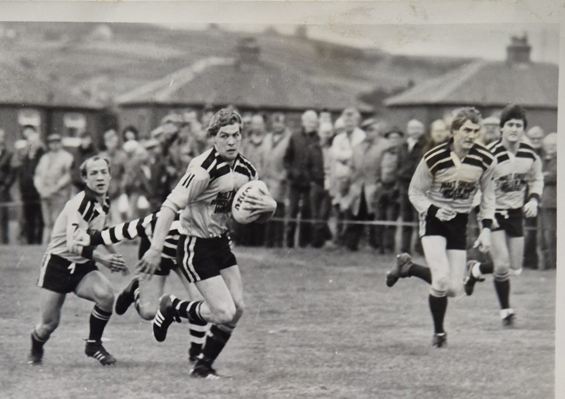 black and white photo of a match