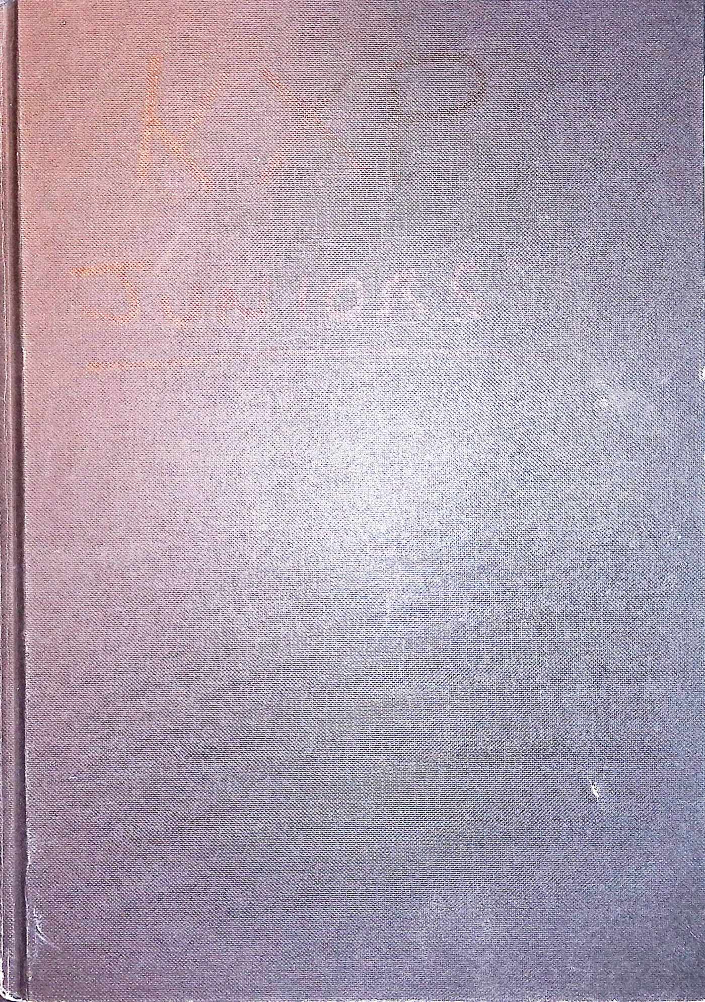 Scan of mid-blue leather effect book cover. In faint black marker pen, handwriting says "KXP Juniors" across the cover