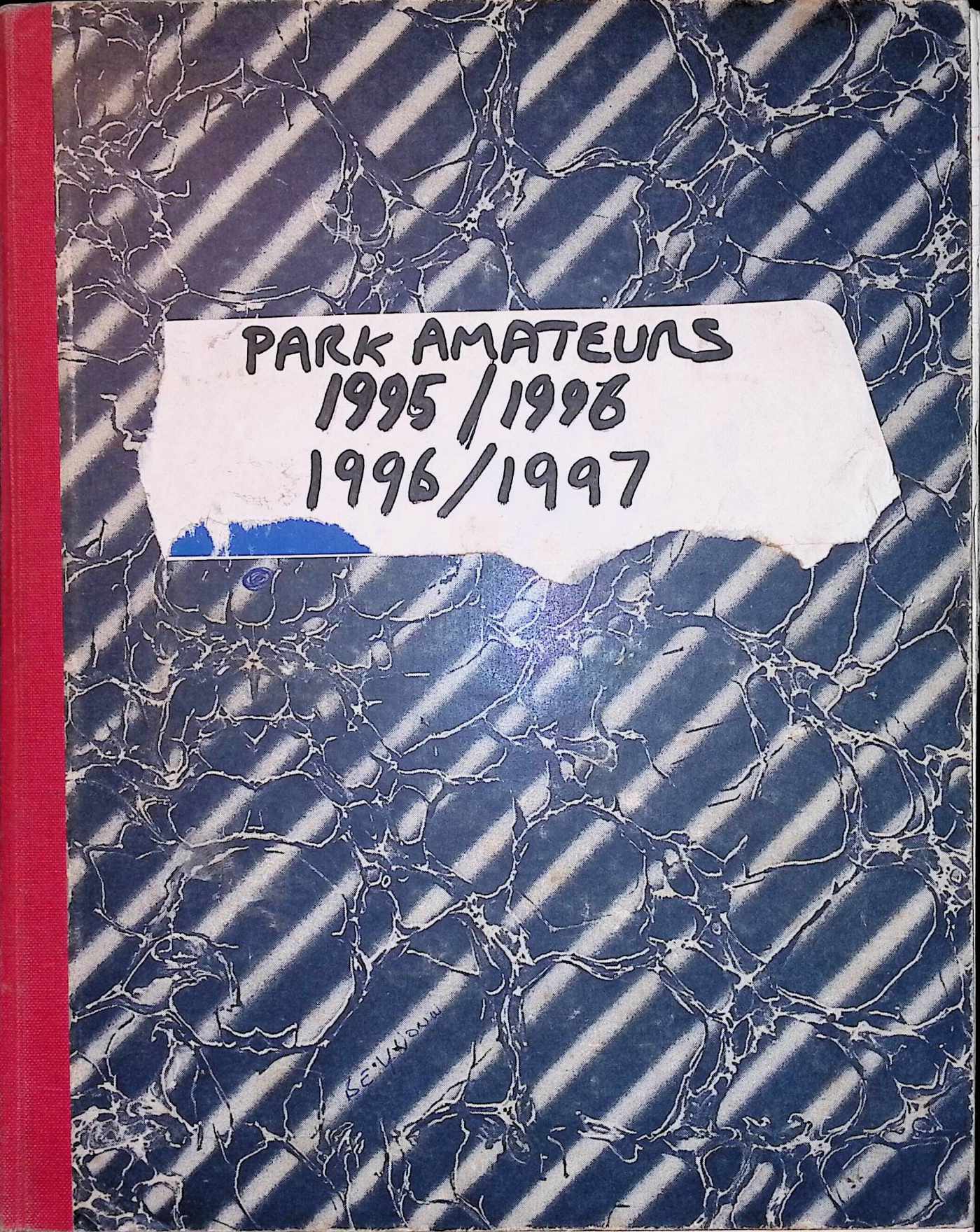 Retro-style notebook cover, with a red spine and blue pattern. A white sticker in the top mid section has black marker handwriting on, saying "Park Amateurs 1995/1996 1996/1997"