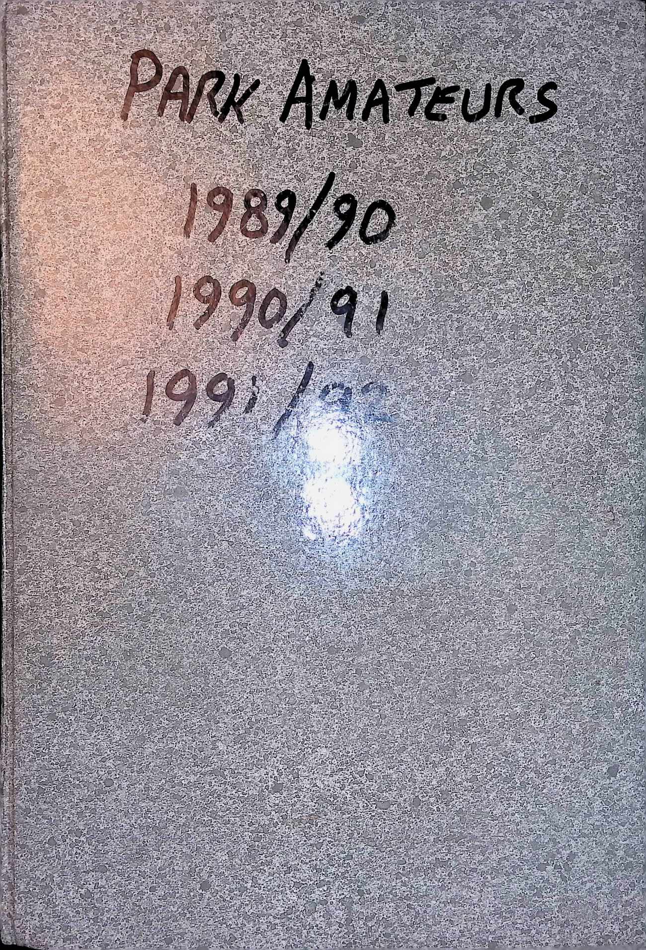 Scan of grey marled book cover, in the middle in black marker handwriting it says "PARK AMATEURS 1989/90 1990/91 1991/92"