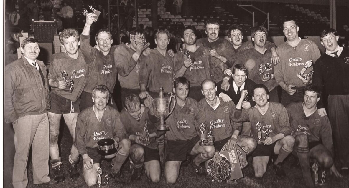 black and white photo of park amateurs winning the HAlifax Championships- two rows of team wearing their kits, holding trophies