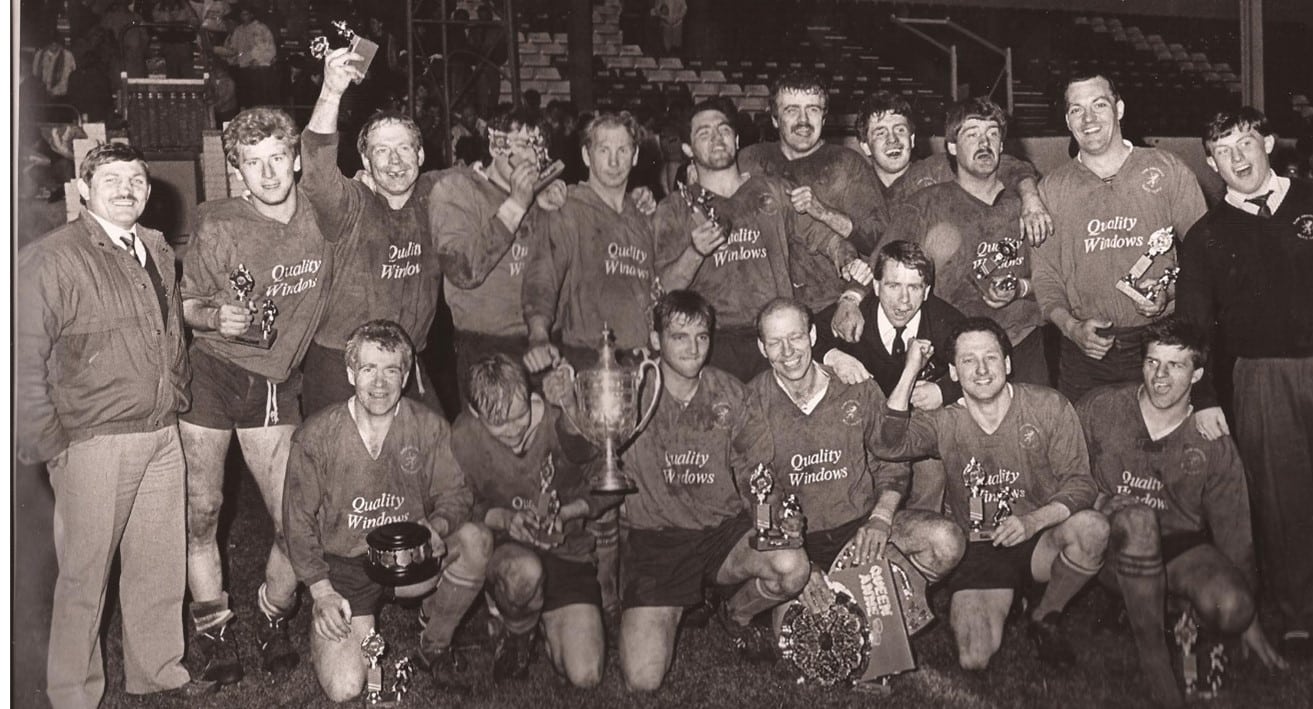 black and white photo of park amateurs winning the HAlifax Championships- two rows of team wearing their kits, holding trophies