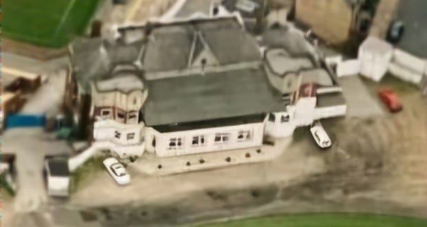 colour aerial photo of Thrum Hall building from the sky 