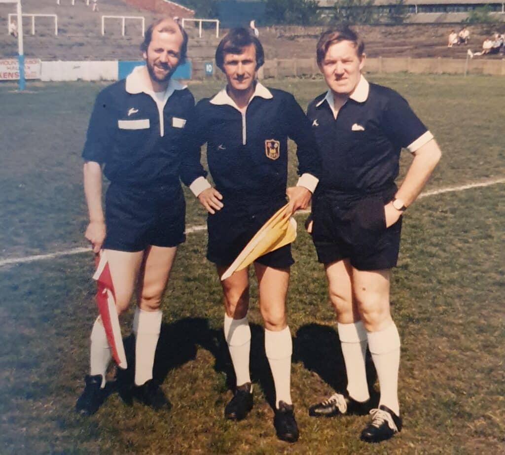 Henry Mason and touch judges at Thrum Hall