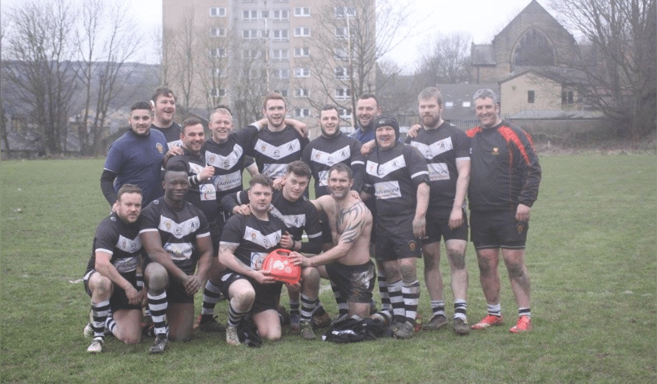 Boothtown Terriers with their new defibrilator