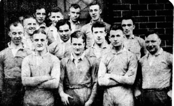 black and white photo of Workshop Winner 1933, a group of players standing together for the photo